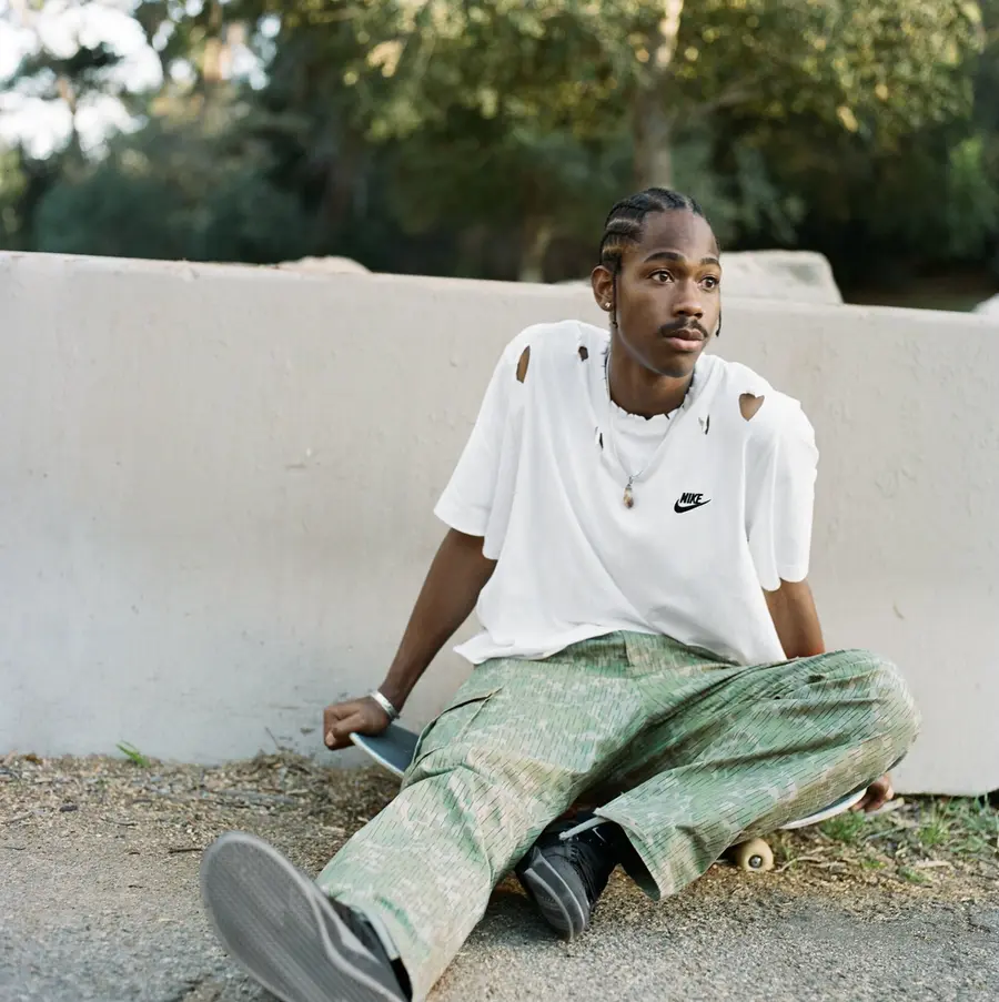 A skater sitting for Nike SB
