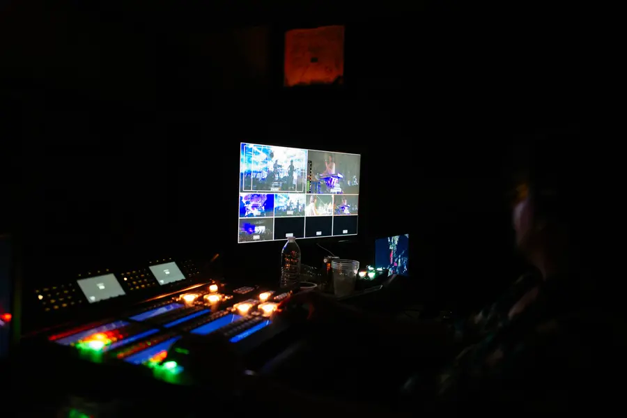 Broadcast desk with the Stones Throw show on the monitors